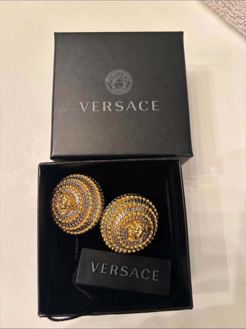 Versace Gold and Silver Medusa Round Button Earrings 100% authentic.